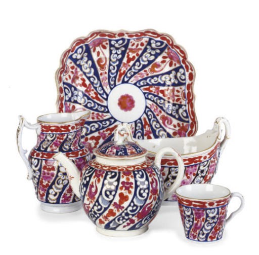 AN ASSEMBLED ENGLISH PORCELAIN PART TEA AND COFFEE SERVICE IN THE 'QUEEN CHARLOTTE' PATTERN,