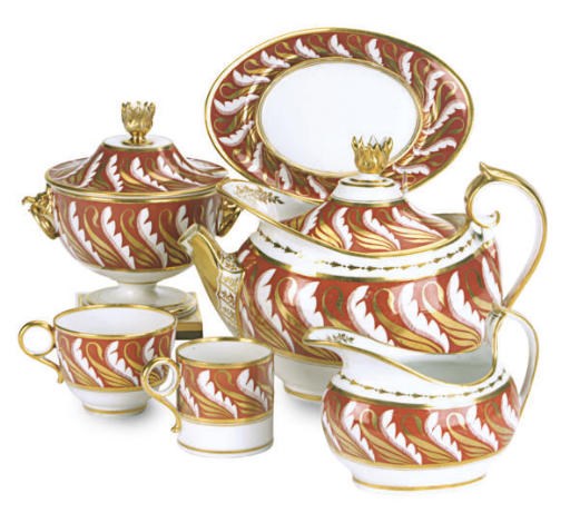AN ENGLISH PORCELAIN IRON-RED GROUND PART TEA SERVICE,