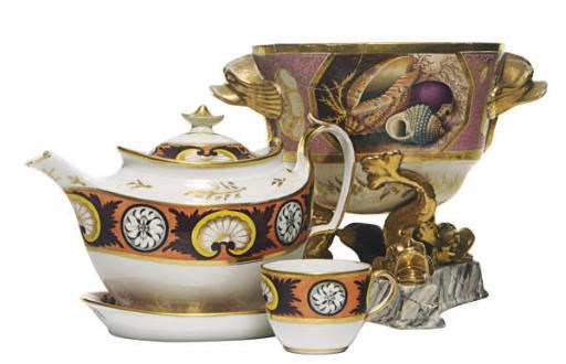 AN ENGLISH APRICOT-GROUND PART TEA AND COFFEE SERVICE AND AN ENGLISH DOLPHIN-FOOTED ICE PAIL,