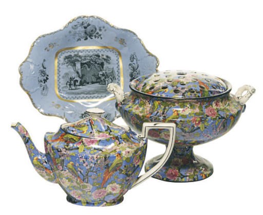 AN ENGLISH PORCELAIN CHINTZ PATTERN PART TEA SERVICE AND A BLUE-GROUND RETICULATED PART DESSERT SERVICE,