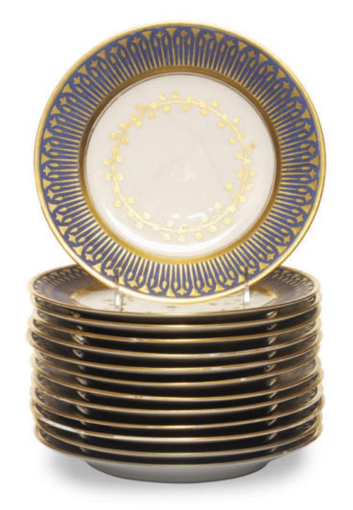A SET OF THIRTEEN FRENCH PORCELAIN GILT AND MATTE BLUE-GROUND DINNER PLATES,