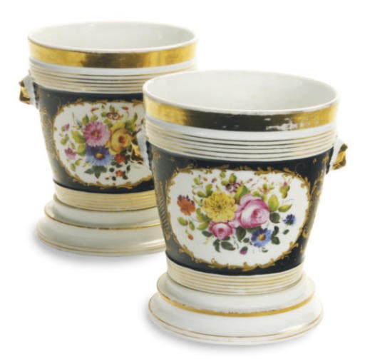 A PAIR OF PARIS PORCELAIN BLACK GROUND FLOWER POTS AND STANDS,