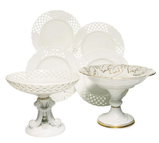 A SET OF SIX CONTINENTAL PORCELAIN RETICULATED PLATES AND A SIMILAR COMPOTE,