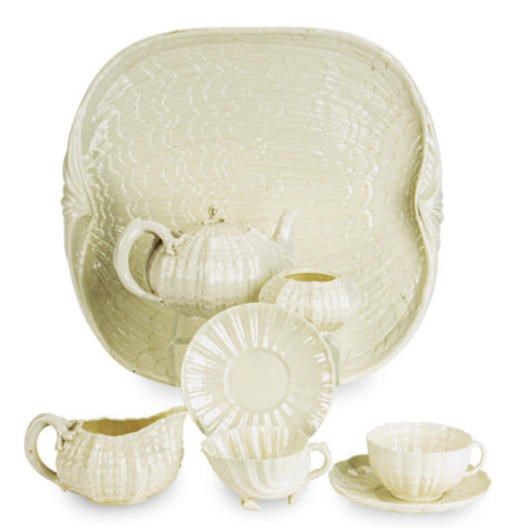 AN ASSEMBLED IRISH BELLEEK PORCELAIN SHELL-MOLDED TETE-A-TETE,
