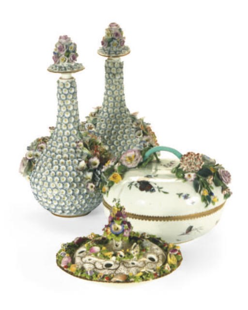 A PAIR OF CONTINENTAL PORCELAIN FLOWER-ENCRUSTED BOTTLE VASES AND STOPPERS AND AN ENGLISH POPOURRI AND COVER,