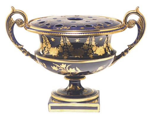 AN ENGLISH PORCELAIN COBALT BLUE GROUND MODEL OF THE WARWICK VASE AND PIERCED BOUGH-POT COVER,