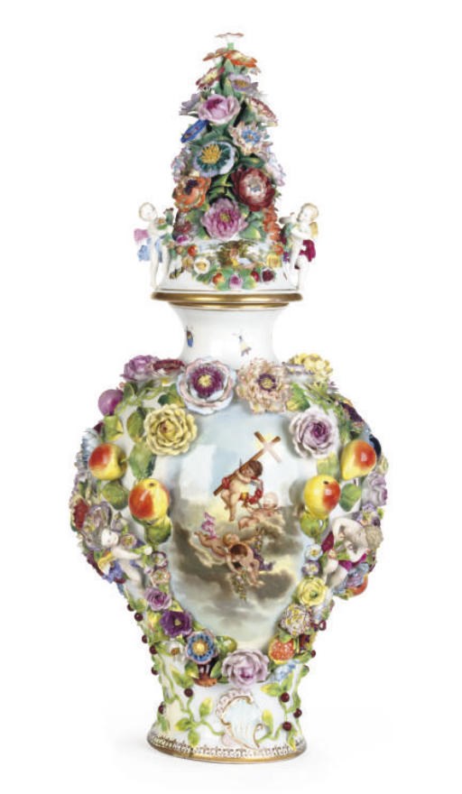 A GERMAN PORCELAIN FLOWER-ENCRUSTED VASE AND COVER,