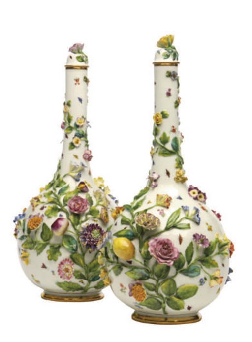 A PAIR OF GERMAN PORCELAIN FLOWER-ENCRUSTED BOTTLE VASES AND STOPPERS,