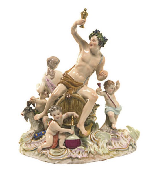 A GERMAN OUTSIDE DECORATED PORCELAIN GROUP OF BACCHUS AND ARIADNE,
