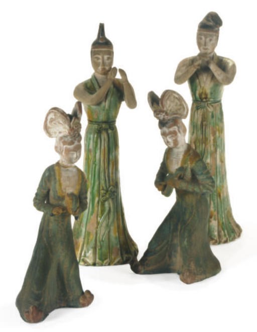 TWO PAIRS OF TANG STYLE POTTERY FIGURES OF MUSICIANS,