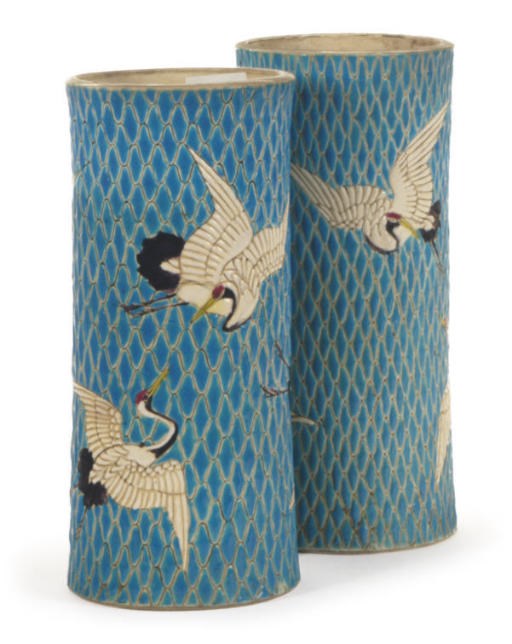 A PAIR OF JAPANESE TURQUOISE GROUND EARTHENWARE VASES PAINTED WITH CRANES,