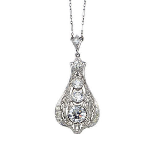 A BELLE EPOQUE DIAMOND AND PLATINUM PENDANT NECKLACE