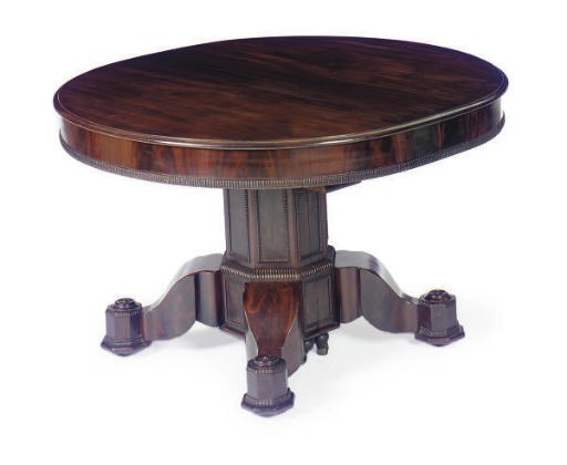 AN AMERICAN MAHOGANY EXTENDING DINING TABLE,