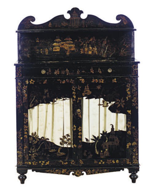 A BLACK AND GILT LACQUER CHIFFONIER,