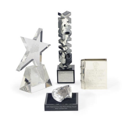 A GROUP OF AWARDS PRESENTED TO KITTY CARLISLE HART,