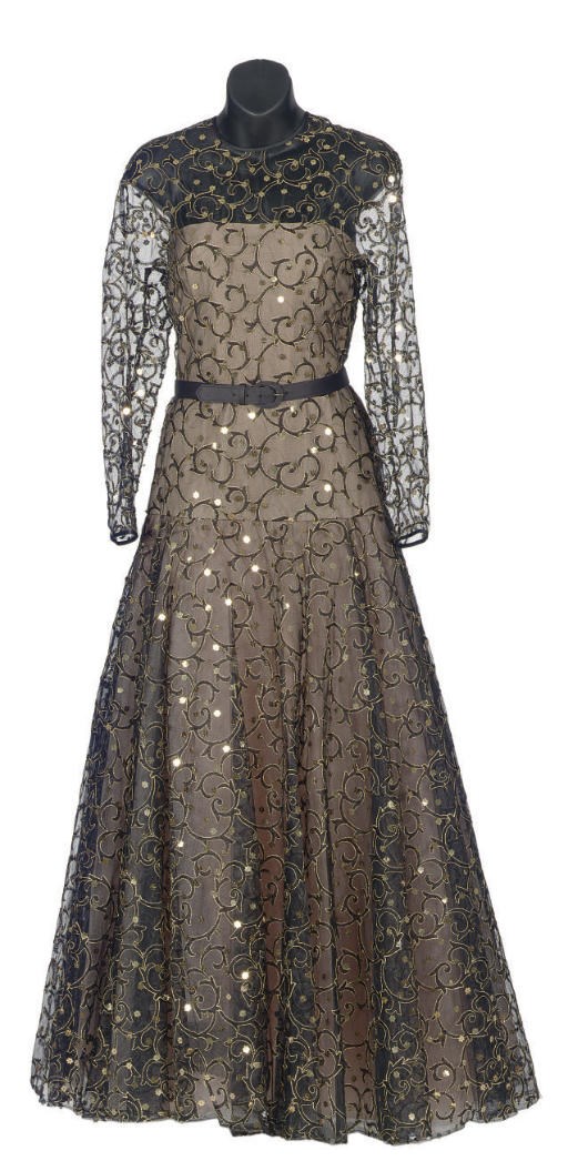 A SCAASI BOUTIQUE BLACK AND GOLD FLORAL APPLIQUE EVENING GOWN,