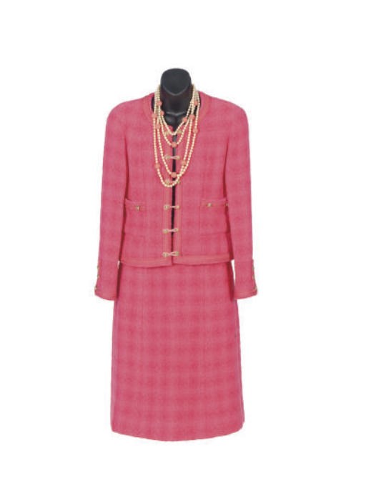 A CHANEL BOUTIQUE ORANGE WOOL DAY-SUIT,