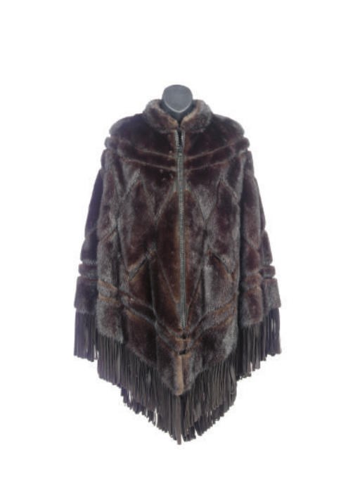 A CHRISTIAN DIOR MINK CAPE WITH SUEDE FRINGE,