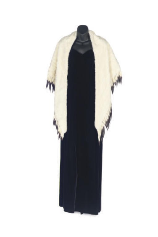 A BLACK VELVET STRAPLESS EVENING GOWN AND ERMINE WRAP**