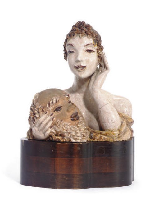 A GLAZED TERACOTTA BUST,