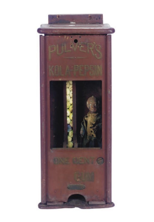 A RED PAINTED TIN GUMBALL DISPENSER,