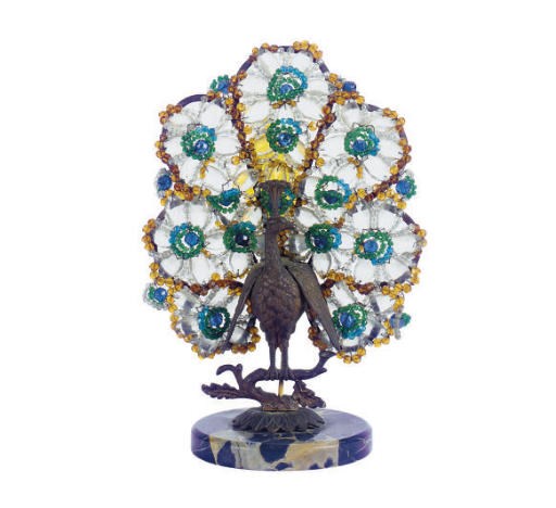 A PATINATED BRONZE AND CUT-GLASS FIGURAL PEACOCK LAMP,