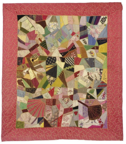 A PATCHWORK QUILT BEARING DESIGNER LABELS AND FABRIC SWATCHES,