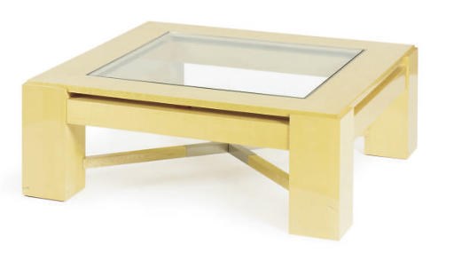 A SATIN BIRCH AND GLASS LOW TABLE
