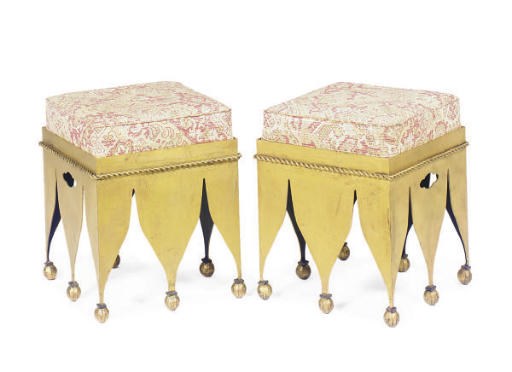 A SET OF FOUR GILT-METAL CUSHIONED STOOLS,