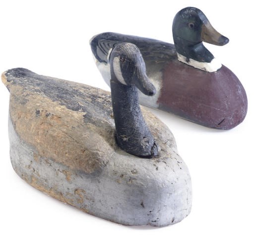 A PAIR OF PAINTED AND CARVED DECOYS WITH HERON