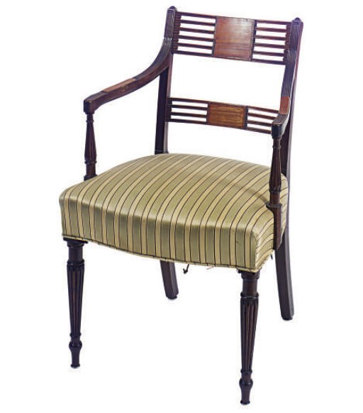 A MAHOGANY AND MAPLE ARMCHAIR,