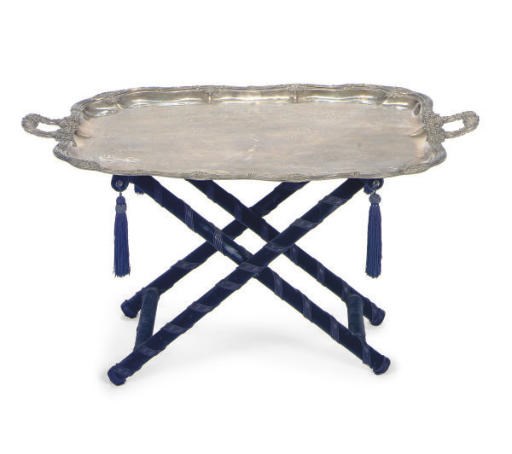 A SILVER-PLATED TRAY ON STAND,