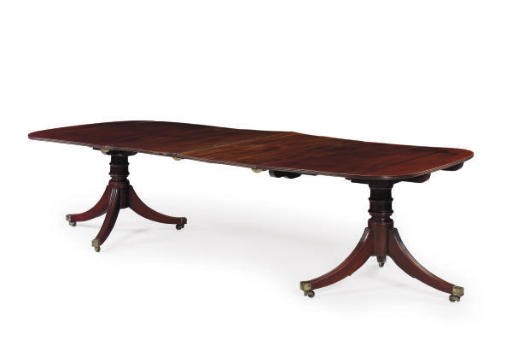A REGENCY MAHOGANY TWO-PEDESTAL DINING-TABLE