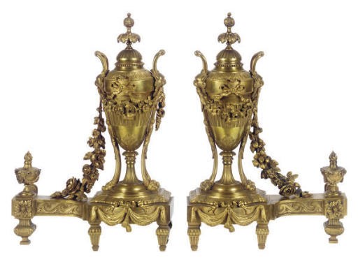 A PAIR OF GILT-BRONZE CHENETS,