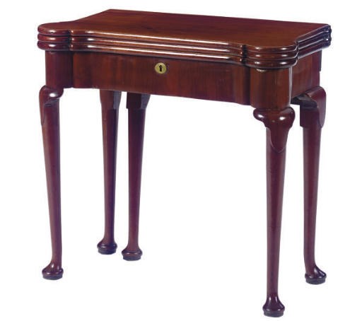 A GEORGE II MAHOGANY TRIPLE FOLD-OVER GAMES TABLE,