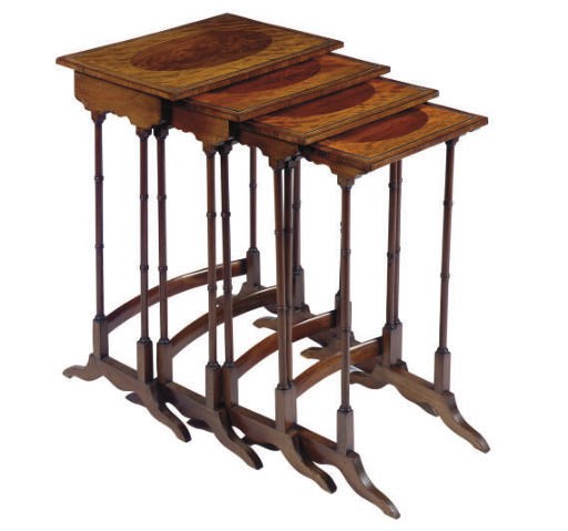 A SET OF ENGLISH INLAID ROSEWOOD BANDED MAHOGANY QUARTETTO TABLES**,