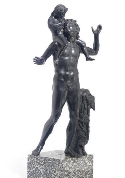A PATINATED BRONZE FIGURE GROUP OF PAN AND A YOUNG BUCK,