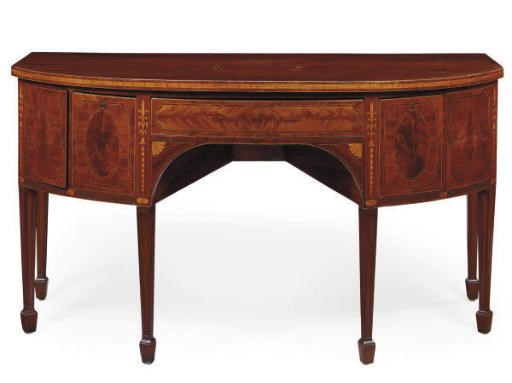 A LATE GEORGE III MAHOGANY BOWFRONT SIDEBOARD