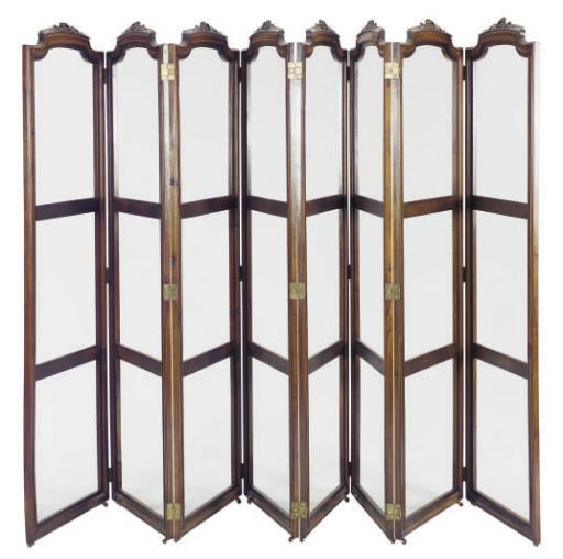 AN AMERICAN EIGHT PANEL WALNUT SCREEN,