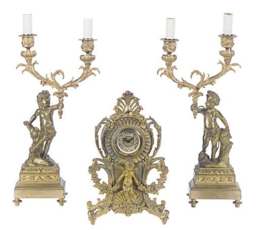 AN ASSEMBLED CONTINENTAL GILT-BRONZE CLOCK GARNITURE,