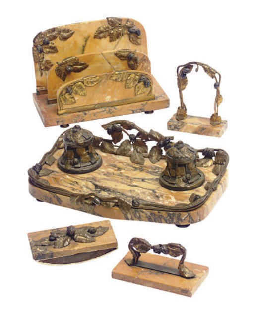 A CONTINENTAL PATINATED AND GILT-METAL MOUNTED MARBLE DESK SET,