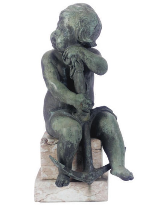 A PATINATED BRONZE FIGURE OF A PUTTO,