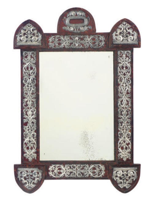 A REPOUSSE WHITE METAL MOUNTED TORTOISESHELL MIRROR**,