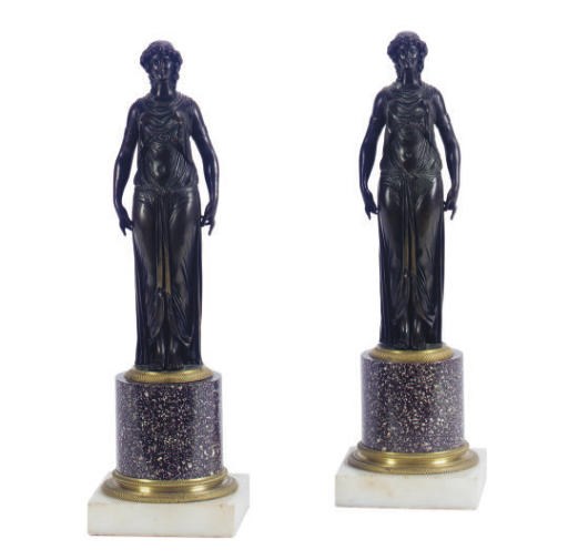 A PAIR OF RESTAURATION BRONZE FIGURES ON PORPHYRY BASES,