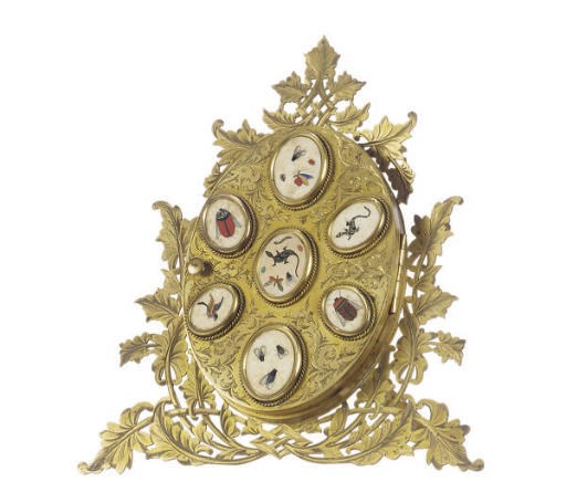 AN ITALIAN GILT-BRONZE AND PIETRA DURA PICTURE FRAME