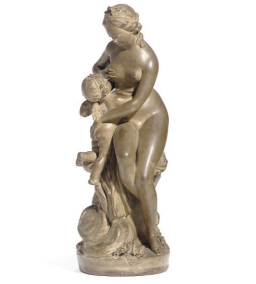 A TINTED-TERRACOTTA GROUP OF VENUS AND CUPID