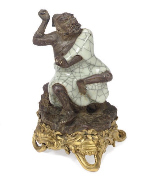 A FRENCH ORMOLU-MOUNTED CHINESE STONEWARE AND CELADON-GLAZED FIGURE