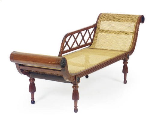 A CHINESE EXPORT HARDWOOD AND PART-EBONIZED CANED RECAMIER,