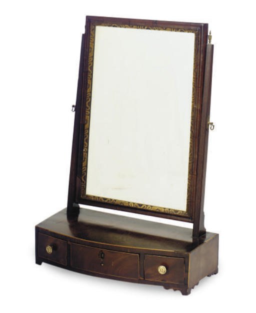 A GEORGE III MAHOGANY AND PARCEL-GILT TOILET MIRROR**,