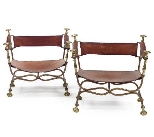 A SET OF FOUR GILT-IRON AND BRASS CURULE ARMCHAIRS,